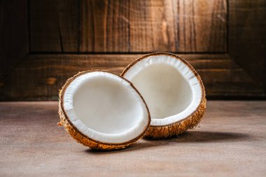 Raw Coconut on wood background