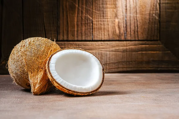 Raw Coconut on wood background