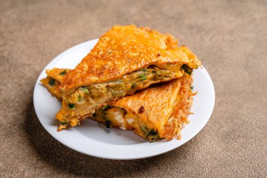 Padang Food - Kızarmış Yumurta (Endonezyaca: Telur Dadar Padang), Batı Sumatra kökenli bir yemektir.