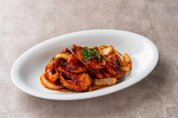 Tereyağı soslu karides (Endonezya: udang saus mentega)