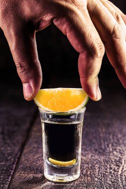Mezcal (veya meskal), agave 'ın mayalanmış meyve suyu ile üretilen, portakalla tüketilen ve içinde bir larva bulunan egzotik alkollü içecek..