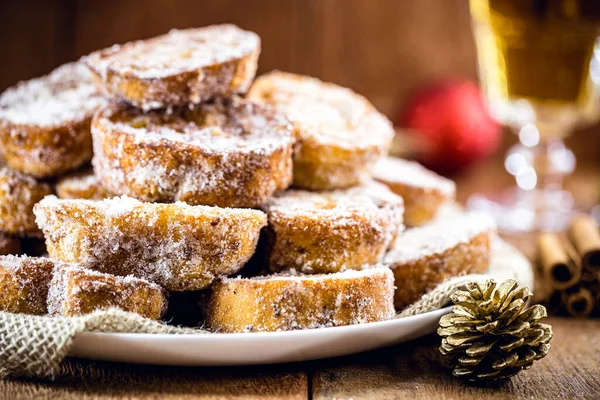 sweet christmas, typical christmas dessert from brazil. Called french toast, baked or fried bread with sugar and cinnamon.