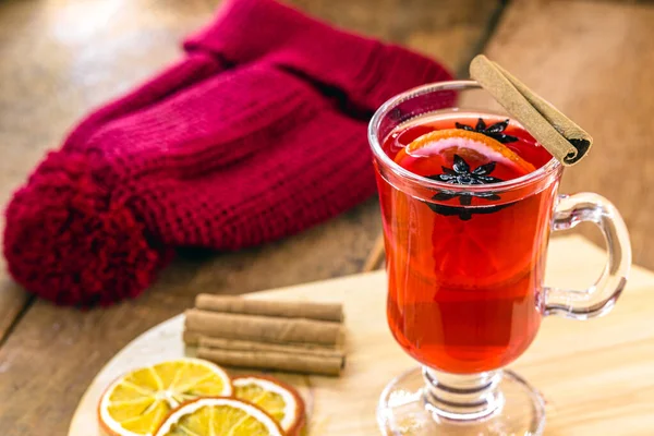 hot winter wine with cap in the background, winter drink