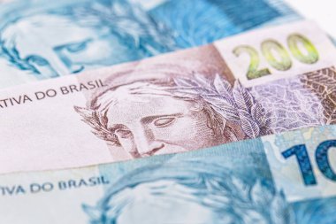 Yüz iki yüz reais banknot, Brezilya 'dan para. Brezilya 'daki ekonomik kriz kavramı, basılı para ve enflasyon