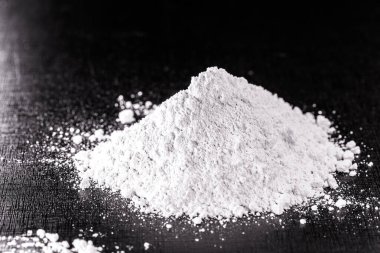 Barium chloride, a substance widely used in the metallurgy sector in tempering salts, with the purpose of increasing the hardness of iron alloys and steels clipart