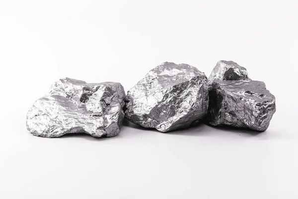 Aluminum Nuggets White Background Industrial Minerals Stock Photo by  ©robertohunger 438988342