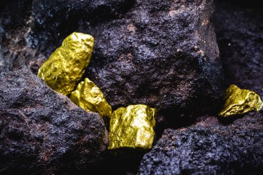 gold nugget in mine, concept of precious stone excavation clipart