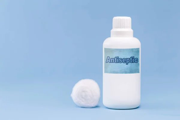 Plastic Container Bottle Antiseptic Hydrogen Peroxide Cotton Medicine Blue Background — Stock Photo, Image