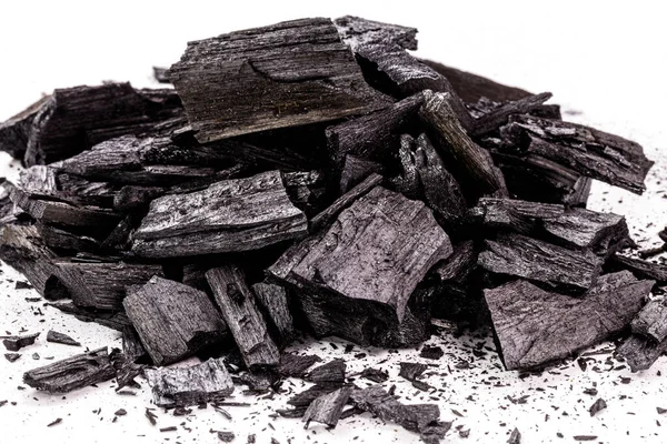 piece of wood-based charcoal, charcoal, with isolated white background