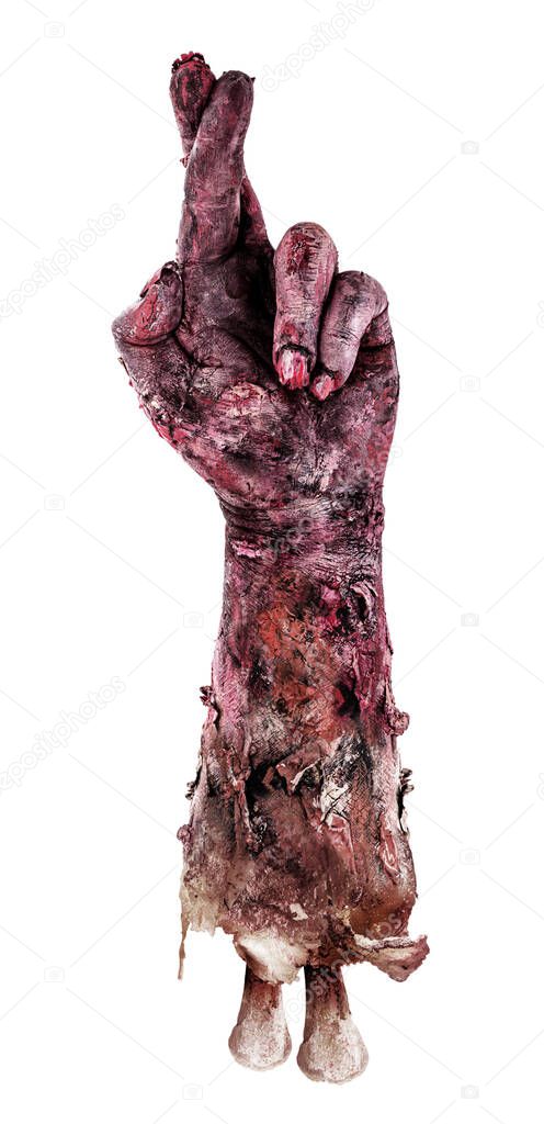 zombie hand with crossed fingers, isolated white background.