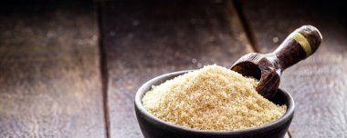 Ahşap zemin üzerinde işlenmemiş şeker kopyalama alanı ile