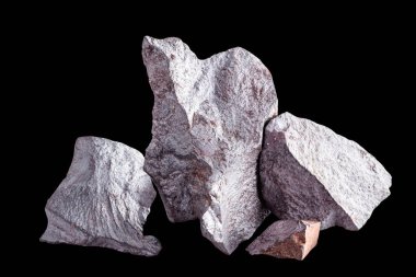 Iron rock ore isolated on the black background.