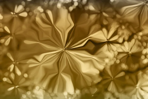 Altın renkli çiçekler şekil desen tasarım arka plan — Stok fotoğraf