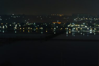 Bulanık arka plan gece ışık bokeh kasaba veya şehir ile 