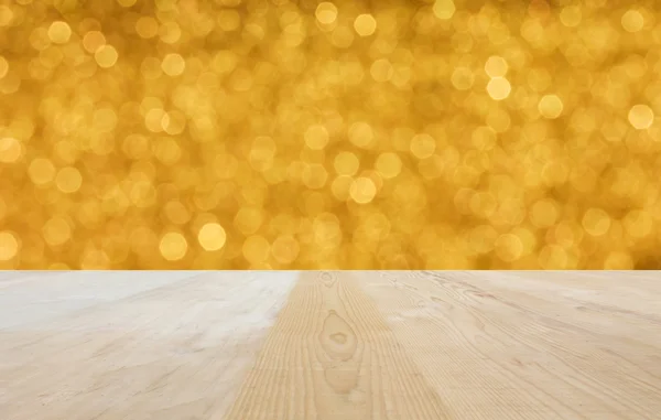 Área em branco ou tampo da mesa de espaço no brilho bokeh de luxo dourado — Fotografia de Stock