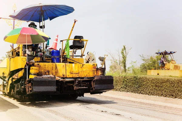 Working road roller or steamroller on the site work