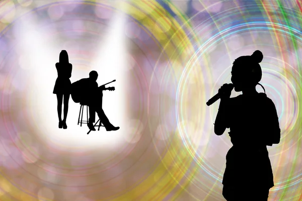 Women silhouette singing or recording music
