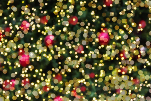 Abstrato fundo colorido de bokeh árvore de Natal com mini — Fotografia de Stock