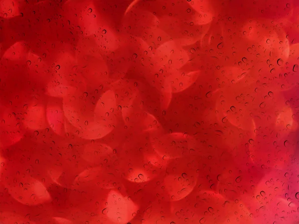 Ρομαντικά κόκκινο bokeh και το νερό, αφήστε την ΠΕΡΙΛΗΨΗ πλάκα καθρέφτη γυαλιού — Φωτογραφία Αρχείου