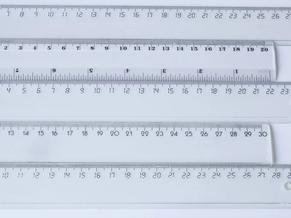 Rulers lot of white background — Stock Photo, Image