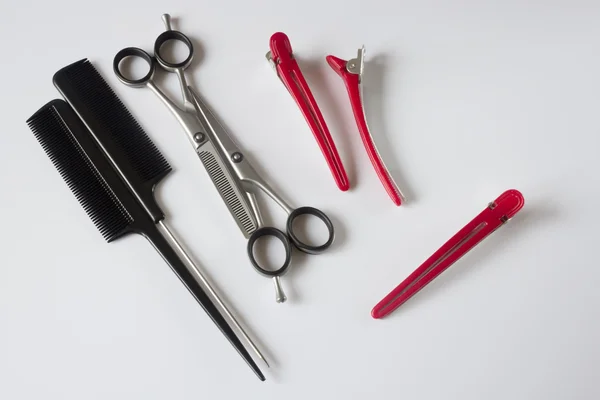 Peluqueros herramientas tijeras peine clips —  Fotos de Stock