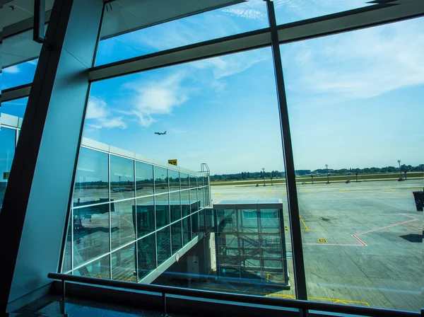 Kiev, Ukraine passenger jet plane flying over airport runway against beautiful dusky sky use for aircraft transport and cargo logistic and traveling business industry. window viev — Stock Photo, Image