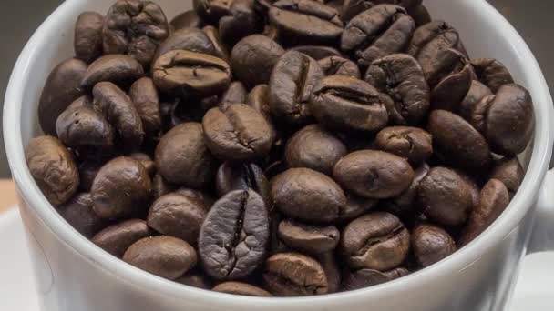 A cup with coffee beans — Stock Video