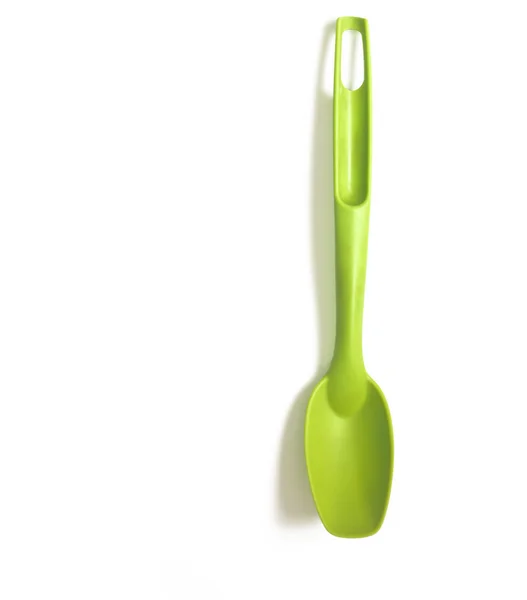 Green kitchen spoon — Stock Photo, Image