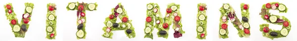 Slovo vitamíny ze salátu — Stock fotografie