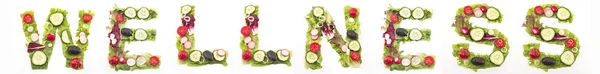 Slovo Wellness ze salátu — Stock fotografie