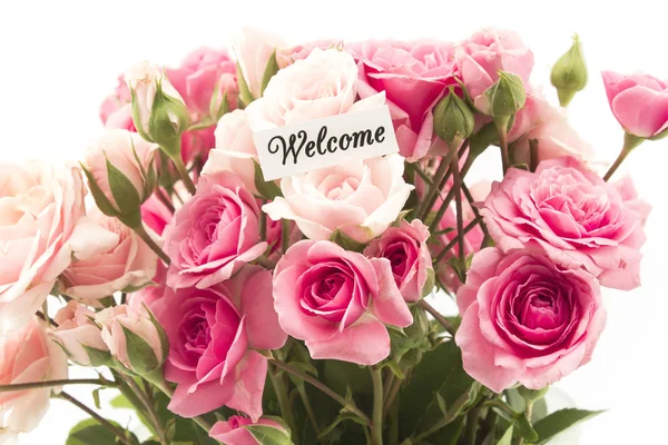 Willkommenskarte mit einem Strauß rosa Rosen — Stockfoto