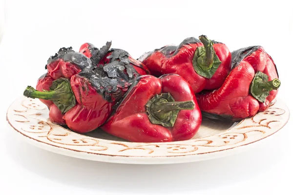 Baked peppers on a ceramic plate — Stock Photo, Image