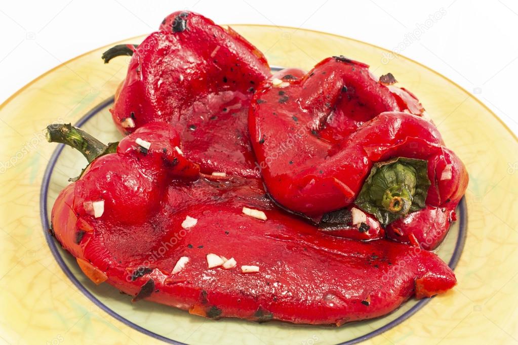 Salad  baked peppers on a yellow plate