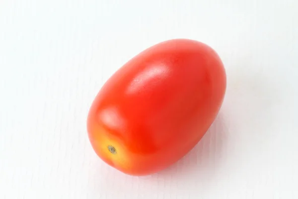 Single Roma Tomatoes on white background, macro — Stock Photo, Image