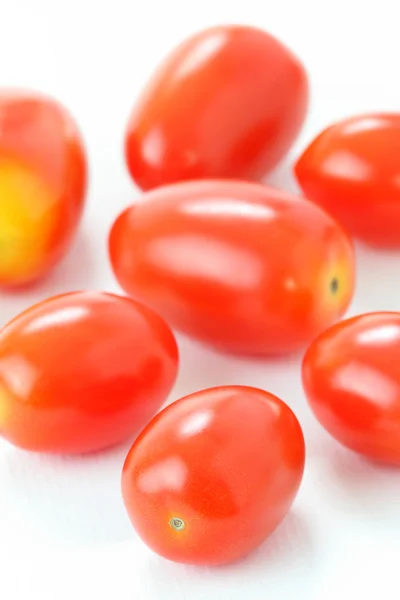 Group of Roma Tomatoes on white background, macro — Stock Photo, Image