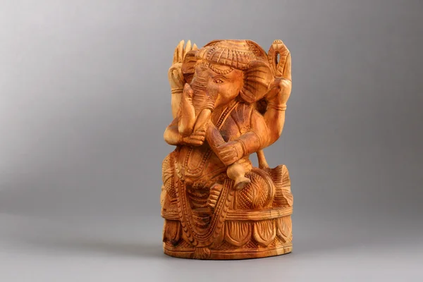 Ganesha Sandalwood carvings, the elephant-deity riding a mouse of Hinduism. This is a common model of god and no copyright, a properties release is not require — Stock Photo, Image