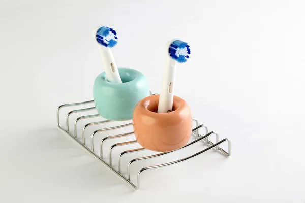 Elektrikli diş fırçaları izole üzerinde beyaz arka plan baş — Stok fotoğraf