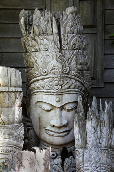 Antique wooden sculpture of head of Thailand Northern god, Chian — Stock Photo, Image
