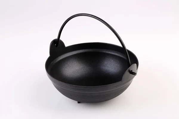 Black iron pot isolated on white background — Stock Photo, Image