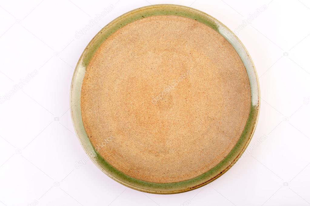 Celadon green ceramic dish, Chiang Mai, Thailand. Isolated on wh