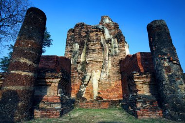Ancient ruins of wall and pillar in Sukhothai Historical Park, S