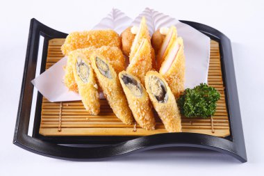 Deep fried Shishamo and crab stick on wooden dish isolated on wh