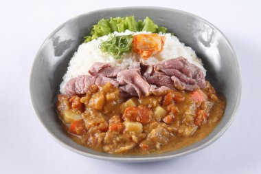 Japanese curry rice with beef isolated on white background