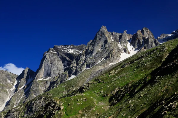 Rock mountain peak with snow at Northern India