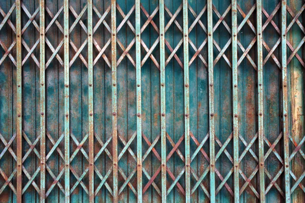 Old style grunge metal blue door with rusty. — Stock Photo, Image
