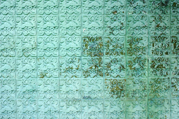 Light blue beautiful pattern on weathered concrete wall texture — Stock Photo, Image