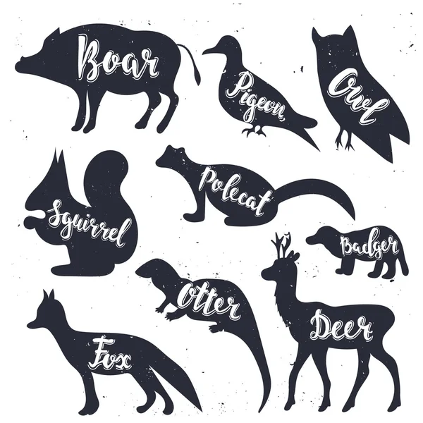 Wild animals silhouettes with lettering — Stock Vector