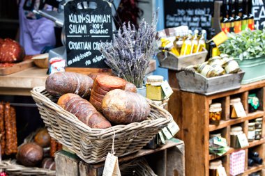 Salami in a basket at Borough market, London, UK clipart