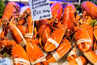 Closeup of lobsters in Borough Market in London clipart