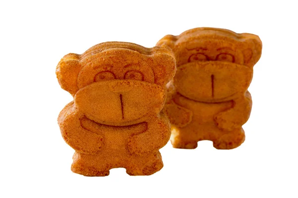 Печенье с начинкой (молочная карамель) в виде обезьяны, является — стоковое фото
